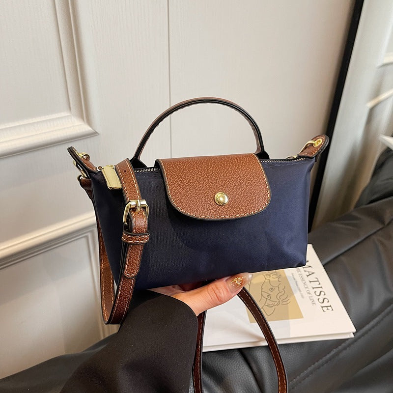 2025 Women's Mini Dumpling Handbag. Made of high - end nylon. Stylish shoulder/crossbody phone bag. - Korvel