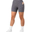 Shorts de sport croisés pour femmes avec ceinture et poches