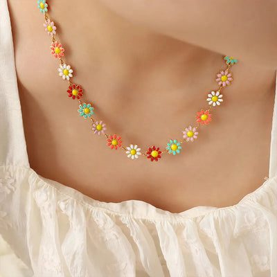 Collier en fleur avec goutte d'huile en acier titane