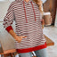 Sudadera con capucha a rayas suelta y casual