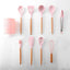 Juego de utensilios de cocina de 11 piezas con mango de madera - Rosa