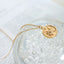 Collar de Estrella y Luna de Circón - Acero de Titanio Baño de Oro