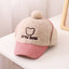 Gorra de béisbol de corduroy cálido para niños con protección para las orejas