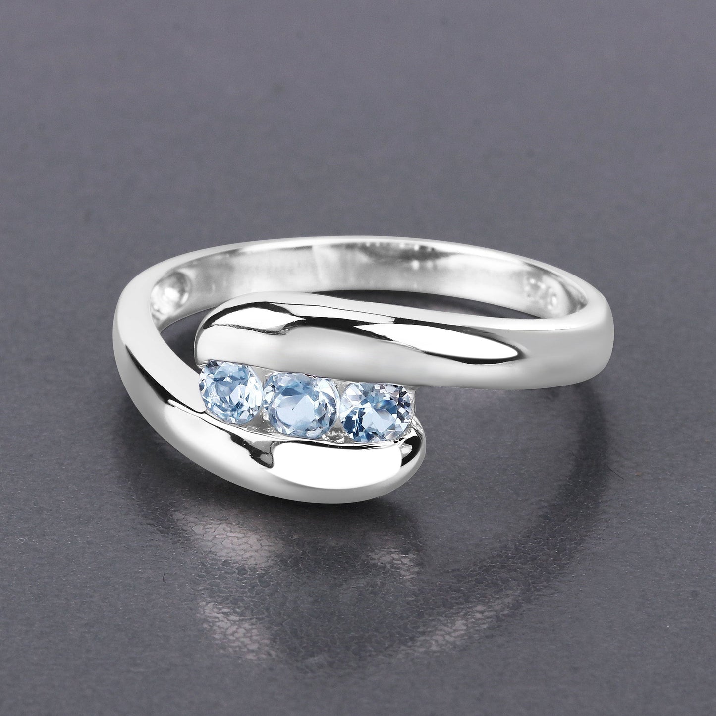 0.74 Carat Genuine Blue Topaz Sterling Silver Bypass Ring
