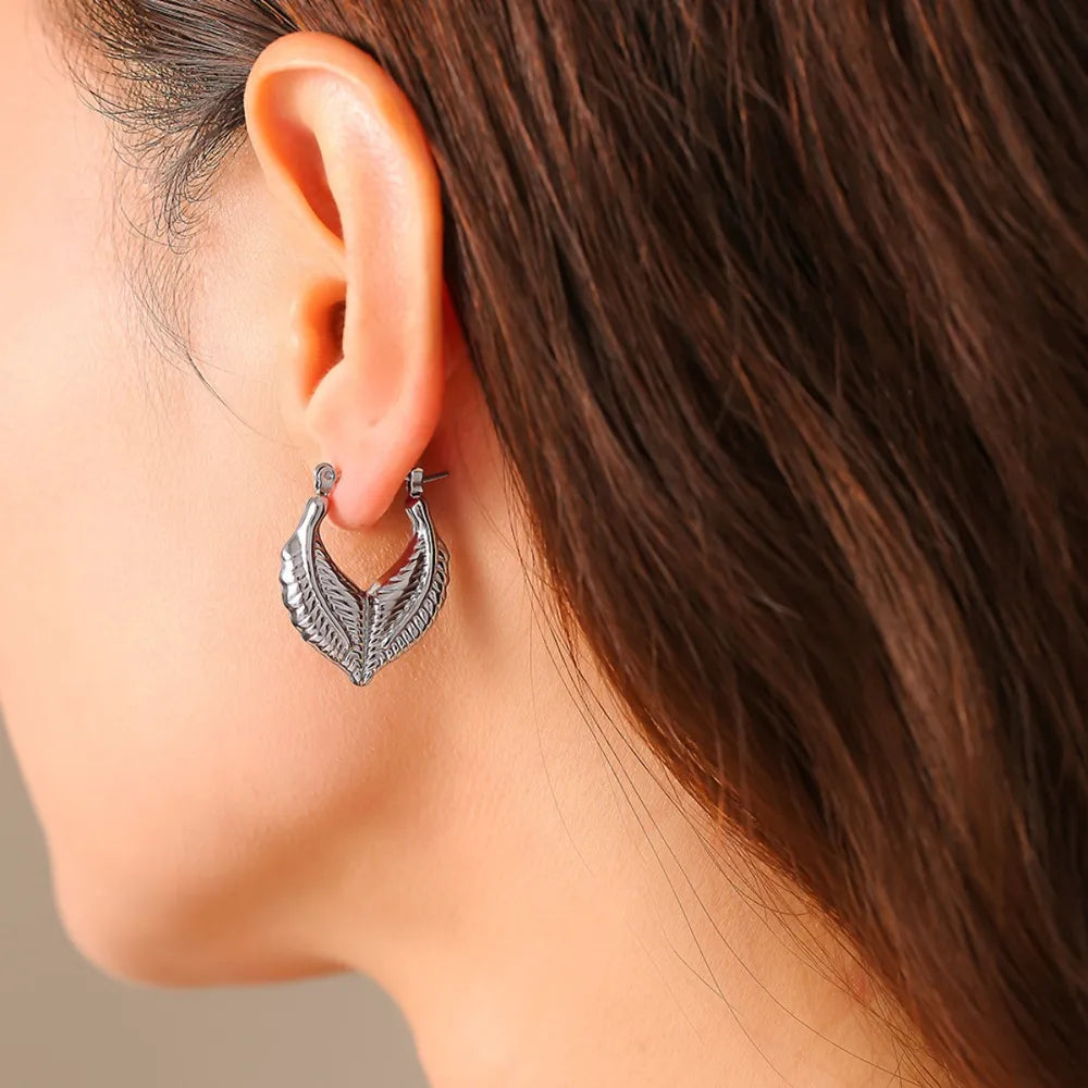 Leaf patchwork heart-shaped earrings with a niche design and titanium steel earrings - Korvel