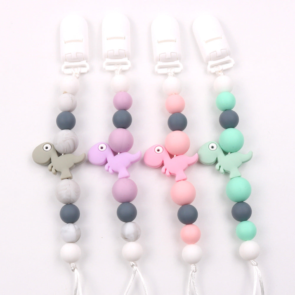 New baby pacifier chain clip teeth glue toy anti-drop chain silicone dinosaur pacifier chain baby products - Korvel