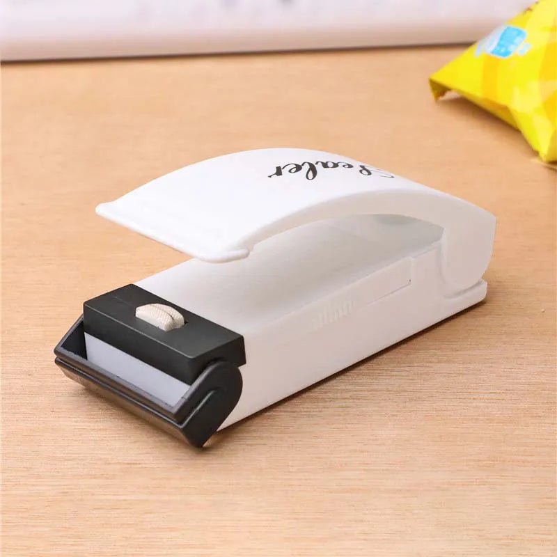 Mini sealing machine small household plastic sealing machine snack moisture-proof sealing machine - Korvel