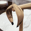 Fashionable fabric cross bow headband - Korvel