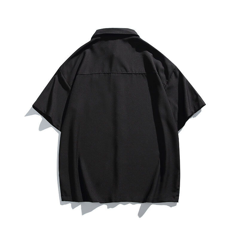 Chemise décontractée à manches courtes avec broderie de lettres