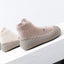 Chaussures de sol souples pour bébés avec chaussettes pour les premiers pas