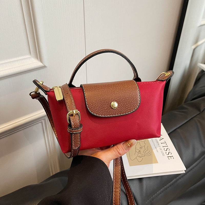 2025 Women's Mini Dumpling Handbag. Made of high - end nylon. Stylish shoulder/crossbody phone bag. - Korvel