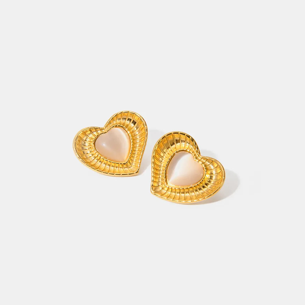 White cat eye stone earrings with niche temperament titanium steel earrings - Korvel