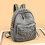 Sac à dos pour ordinateur portable de grande capacité avec design clouté