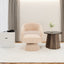 Fauteuil pivotant en tissu teddy nude