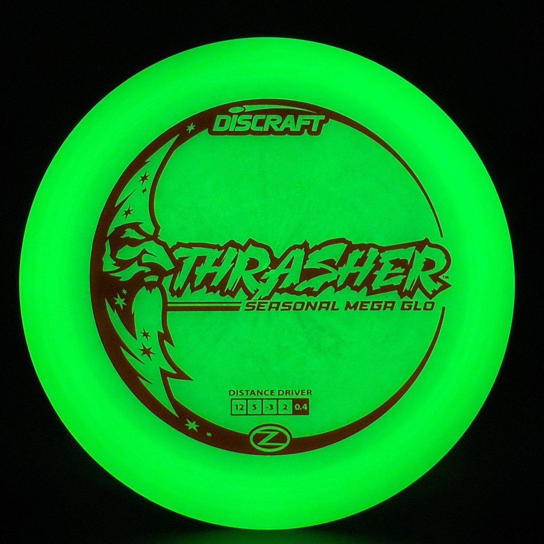 Mega Glo Thrasher - Disque de Golf de Nuit Saisonnière