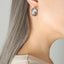 Boucles d'oreilles en titane personnalisées en forme de double U pour femmes
