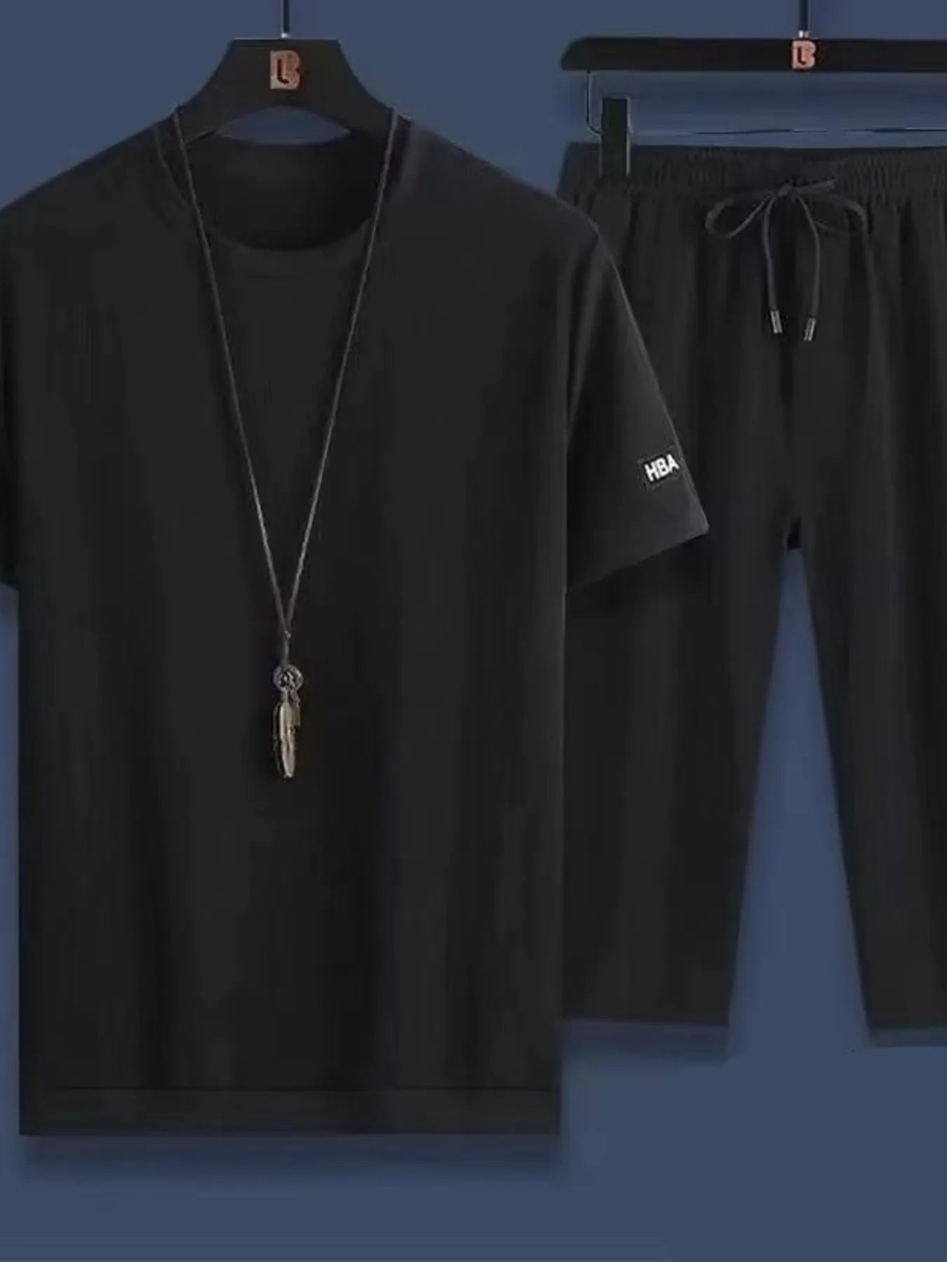 Conjunto de camiseta de cuello redondo de manga corta y pantalones cortos para hombres en tallas gra