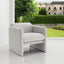 Armchair with wavy armrests, metal decorations on both sides of the armrests, made of Teddy cloth, light gray - Korvel
