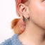 Pendientes de gota en forma de infinito de zafiro y diamante en plata esterlina .925