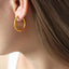 Boucles d'oreilles Huggie en acier titane premium