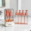 Dispensador de artículos de tocador TravelMate 4 en 1