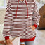 Sudadera con capucha a rayas suelta y casual