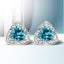 Boucles d'oreilles en argent sterling .925 avec topaze bleue taille trillion et accents en diamant