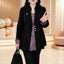 Manteau noir élégant ajusté pour un style quotidien