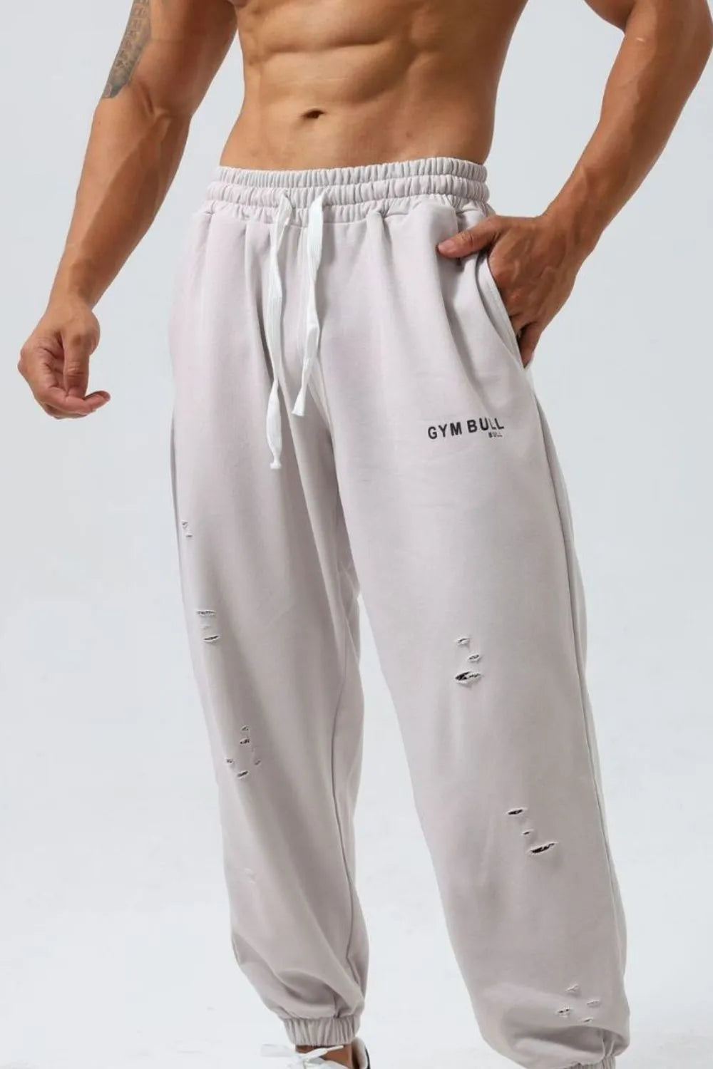 Joggers de tiro alto para hombres en tallas grandes con diseño desgastado y cordón