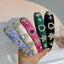 Fashionable Camellia Heart Solid Color Sponge Headband