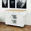 Kitchen trolley with rubber wood leaf countertop, 5-wheel kitchen island, storage cabinet and 3 dining drawers, white - Korvel