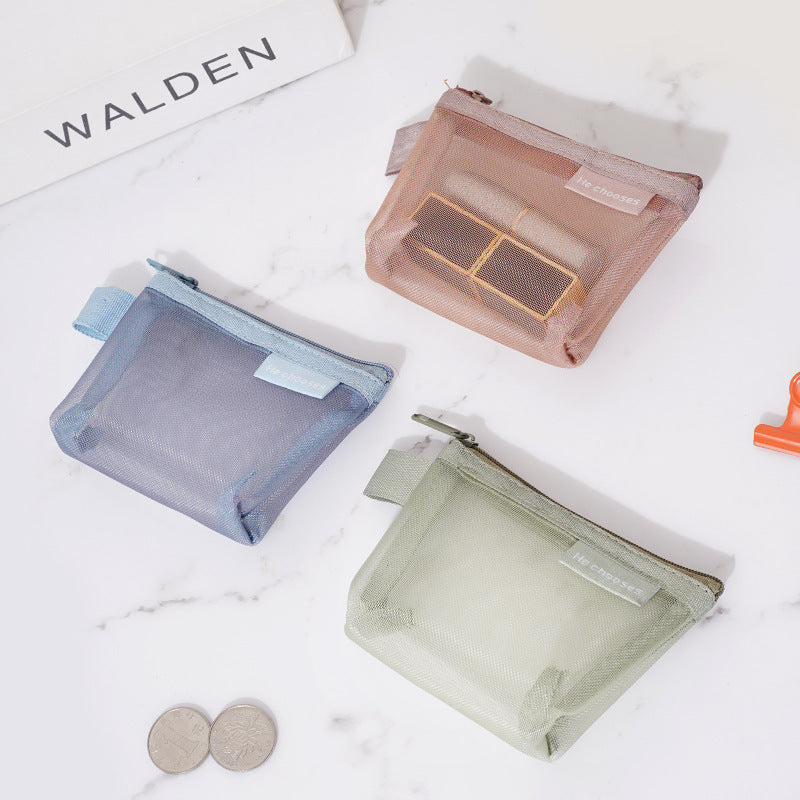 Simple three-dimensional triangle mesh coin key earphone storage bag transparent storage bag - Korvel
