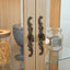 Light colored glass cabinet with adjustable glass frame, including cabinet light bulbs OAK with 2 doors and 1 drawer - Korvel