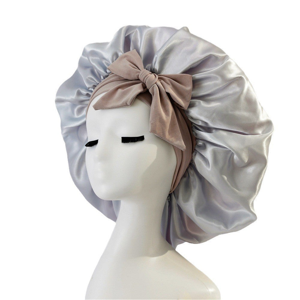 Turban élégant à large bord avec détail en nœud