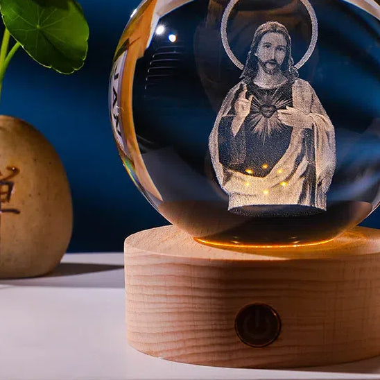Luminous crystal ball with carved Jesus solid wood base for home decoration - Korvel