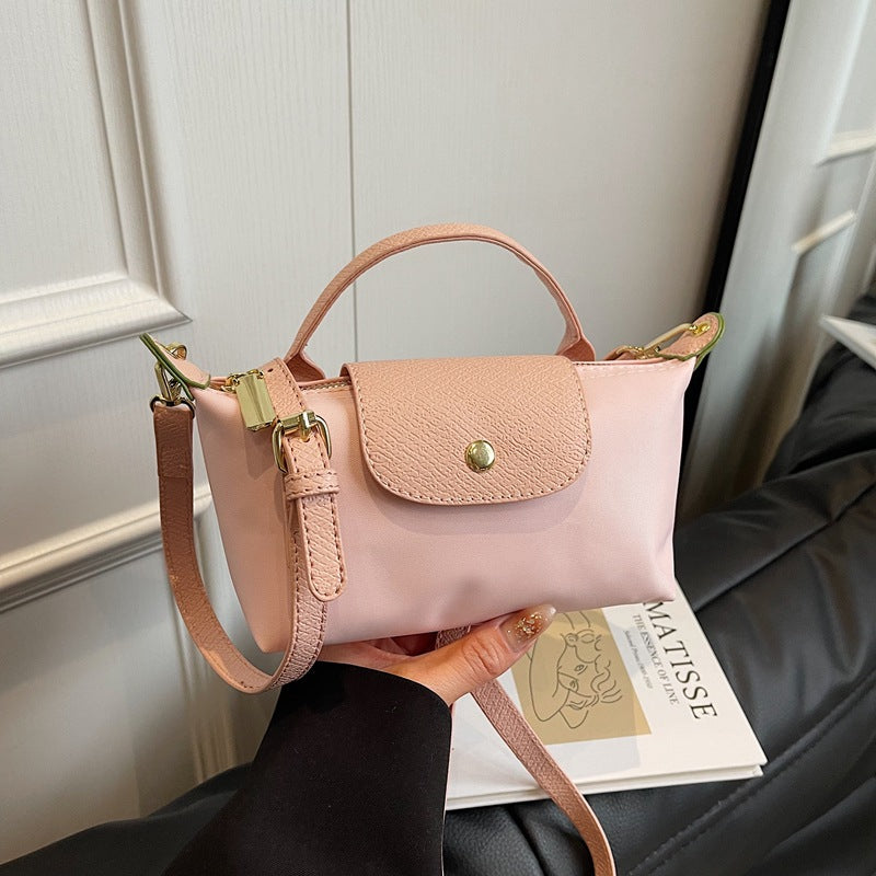 2025 Women's Mini Dumpling Handbag. Made of high - end nylon. Stylish shoulder/crossbody phone bag. - Korvel