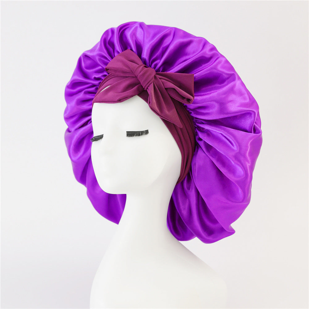 Turban élégant à large bord avec détail en nœud