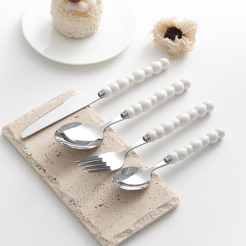 Set of 4 Stainless Steel price Creative Stainless Steel Colorful Pearl Handle Spoon Fork Knife High End Cutlery Set - Korvel