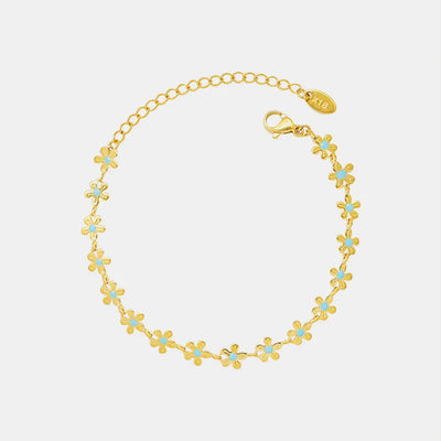 Pulsera de Aceite Azul Gota Flor Dorada