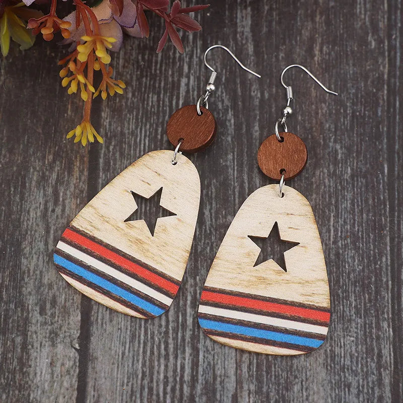 Boucles d'oreilles pendantes en bois découpé étoiles et rayures