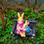 Simulated rabbit reading animal ornament - Korvel
