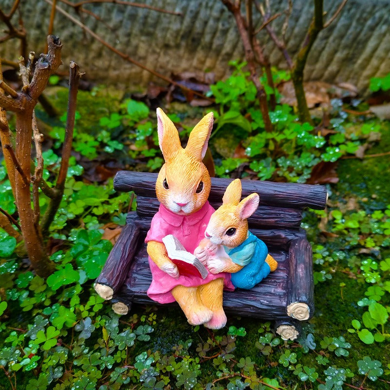 Simulated rabbit reading animal ornament - Korvel