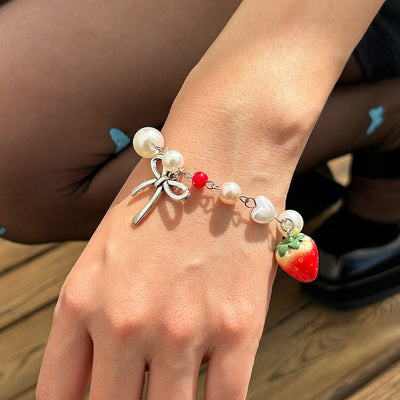 Sweet strawberry bow bracelet Bracelet temperament versatile imitation pearl vacation jewelry - Korvel