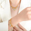 Pulsera de encanto de acero de titanio chapado en oro