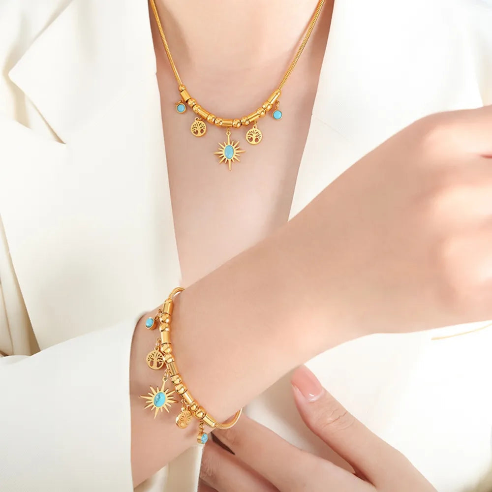Pulsera de encanto de acero de titanio chapado en oro