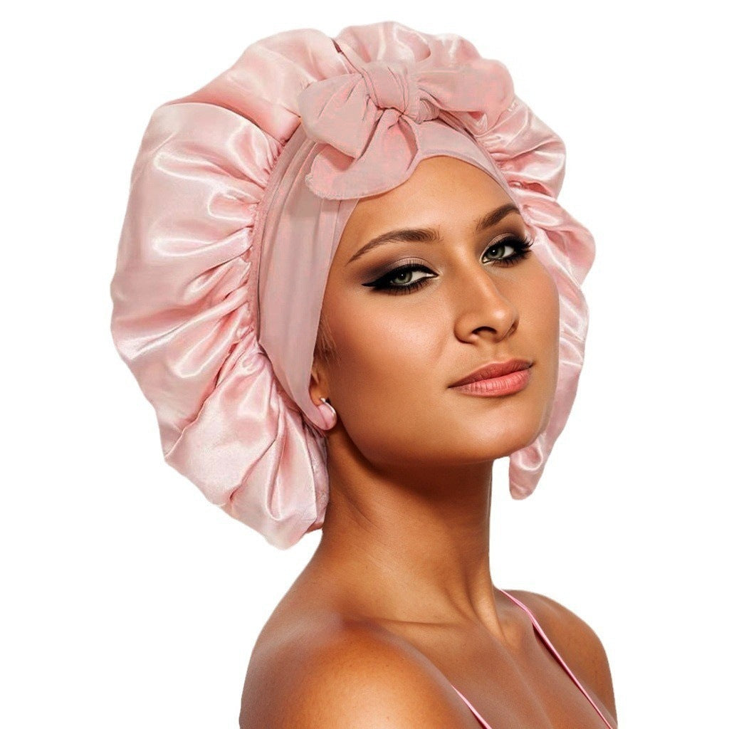 Turban élégant à large bord avec détail en nœud