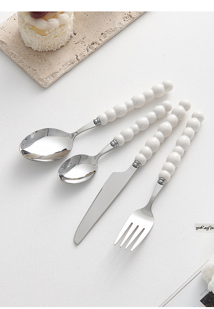 Set of 4 Stainless Steel price Creative Stainless Steel Colorful Pearl Handle Spoon Fork Knife High End Cutlery Set - Korvel