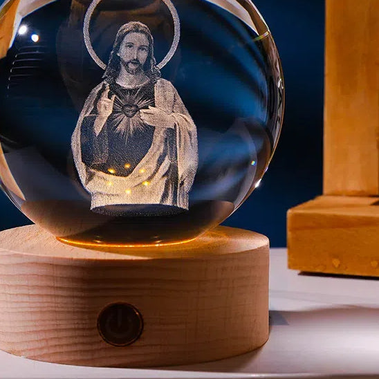 Luminous crystal ball with carved Jesus solid wood base for home decoration - Korvel