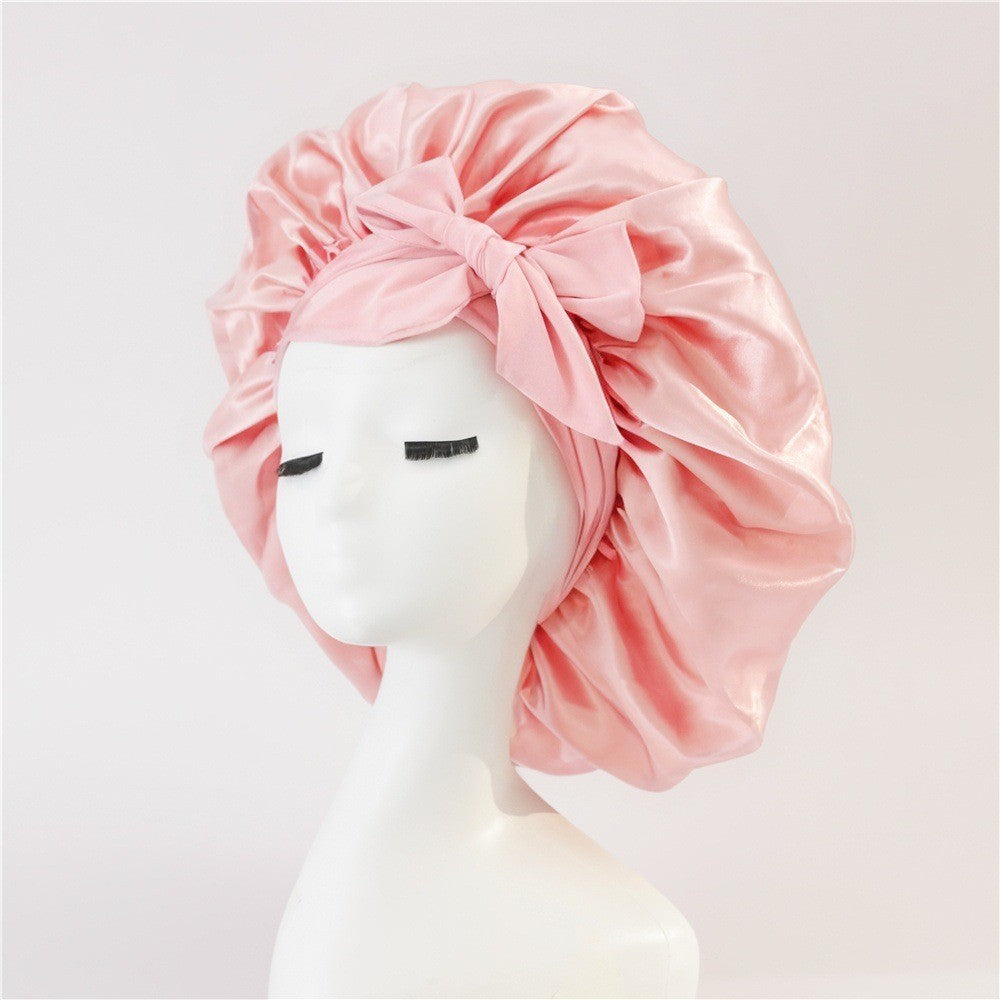 Turban élégant à large bord avec détail en nœud