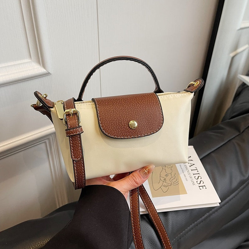 2025 Women's Mini Dumpling Handbag. Made of high - end nylon. Stylish shoulder/crossbody phone bag. - Korvel